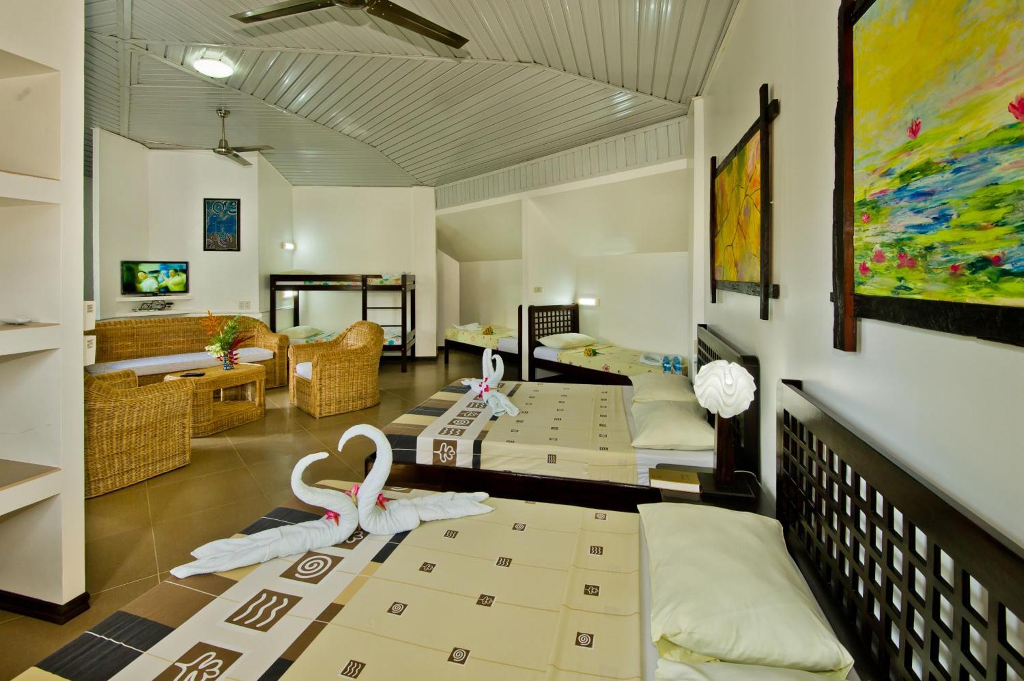 Balay Tuko Garden Inn Puerto Princesa Номер фото
