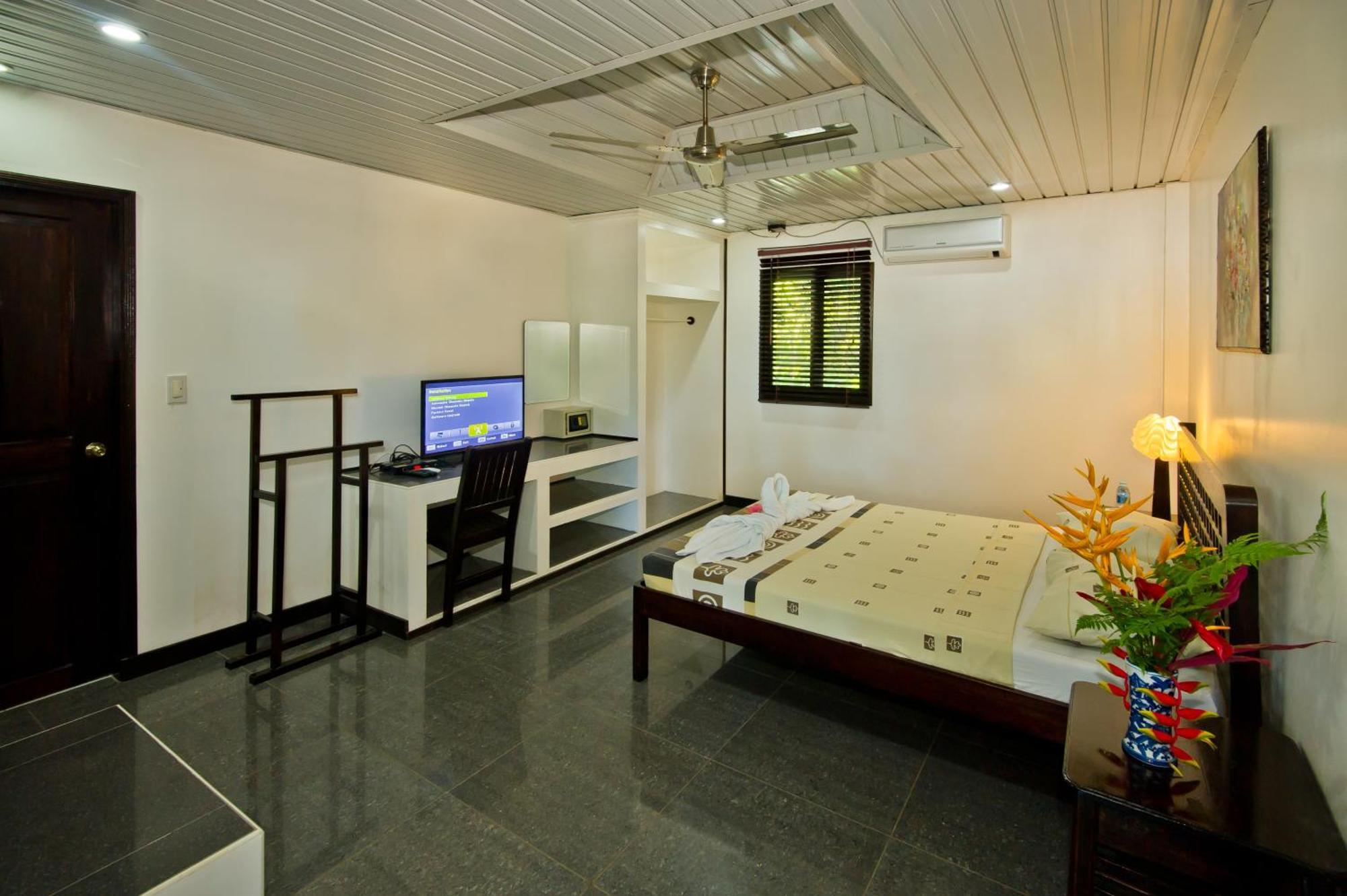 Balay Tuko Garden Inn Puerto Princesa Номер фото